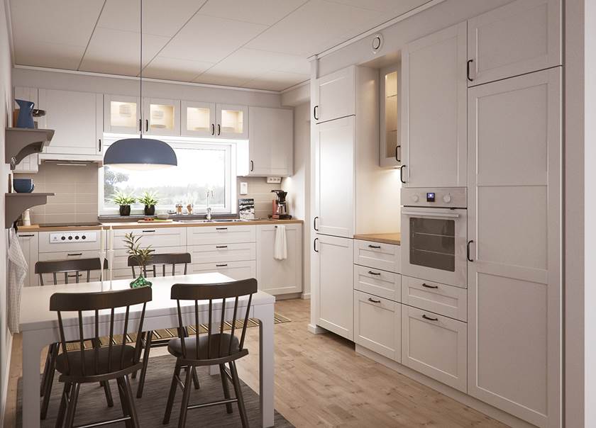 Vy över kök och matplats i lägenhet