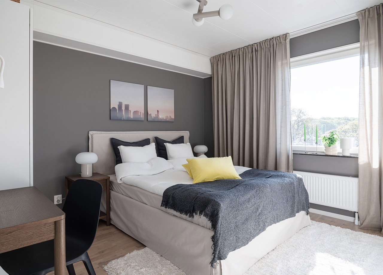 Foto av sovrum i visningslägenhet i Växhuset 2rok